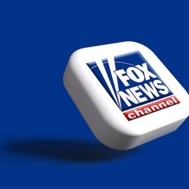 a Fox News channel icon in 3D on a blue background