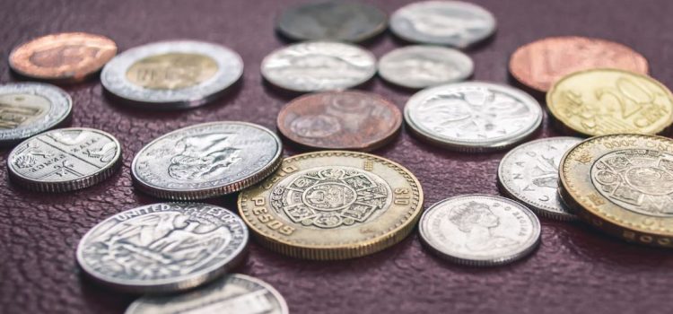 A pile of Mexican pesos on a table