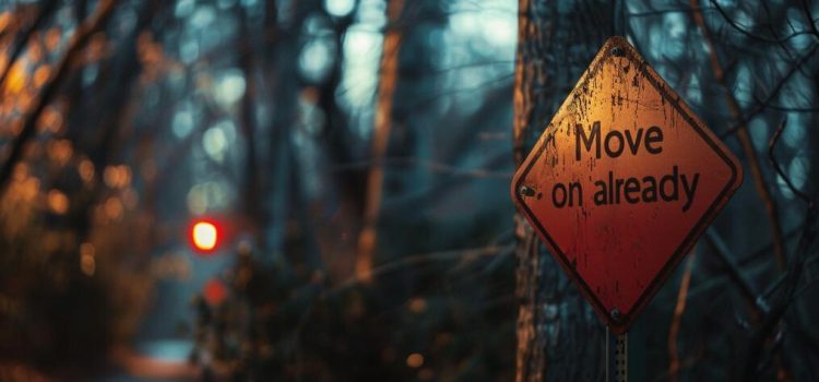 a sign on a wooded pathway says "Move on already," illustrating grief myths debunked by Megan Devine