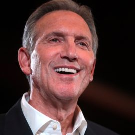 Former CEO of Starbucks Howard Schultz smiling