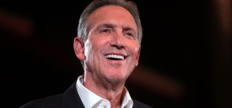 Former CEO of Starbucks Howard Schultz smiling