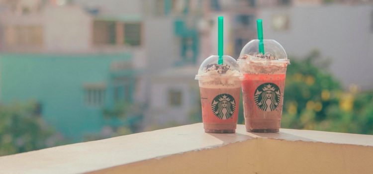 Two new Starbucks drinks on a ledge as part of the innovation strategy at Starbucks