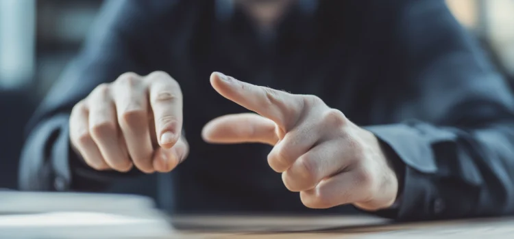 A man practicing lucid dreaming reality-checking by touching two fingers together