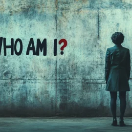 A woman in business attire conflicted about identity and leadership, looking at a wall that reads "Who am I?"