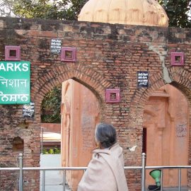 Bullet marks on a preserved wall at Jallianwala Bagh as a memorial to the Amritsar Massacre