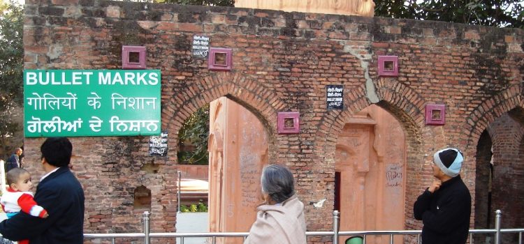 Bullet marks on a preserved wall at Jallianwala Bagh as a memorial to the Amritsar Massacre