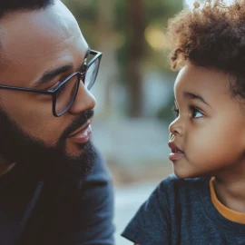 A parent practicing active listening with his child