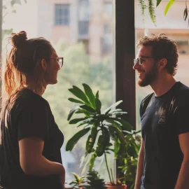 Two co-workers displaying trust in business in an office