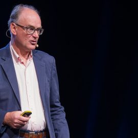 Matt Ridley talking on stage and giving a speech