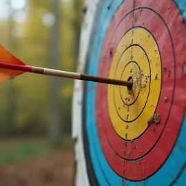 An arrow hitting a bullseye on a target illustrates how to know your target market