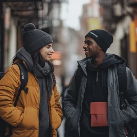 Two people getting to know each other by talking on the street