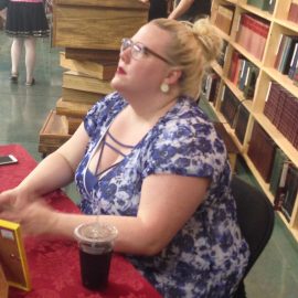 Author Lindy West in a bookstore