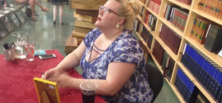 Author Lindy West in a bookstore