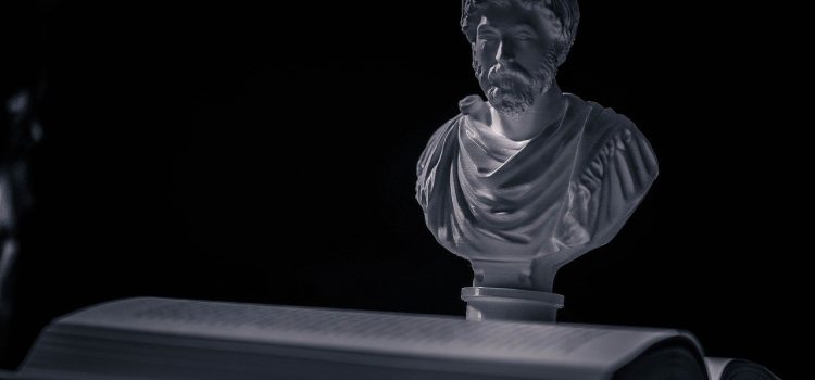 A bust of Seneca and an open book illustrate Seneca's writing