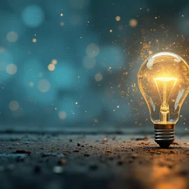 A upright light bulb resting on the floor with sparkles around it illustrates how to turn ideas into reality